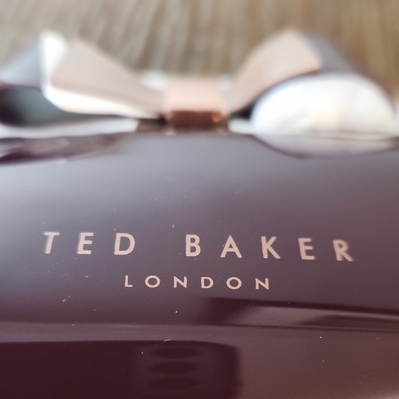 Ted Baker Handbags - Ted Baker NWOT Purple Cosmetic Pouch with Bow